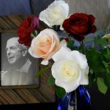 Leonard Cohen with roses